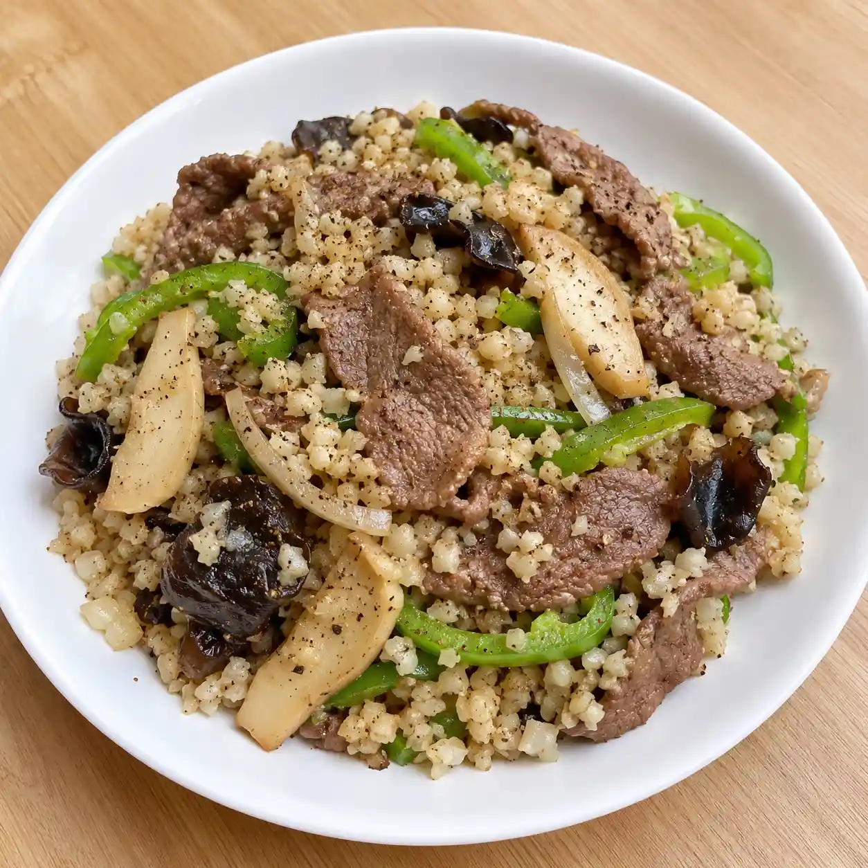 孜然牛肉白花椰米乾炒