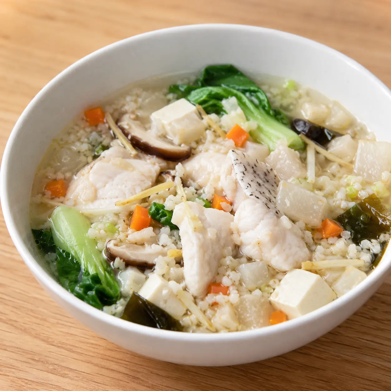 薑絲魚片根莖丁花椰米湯泡飯感