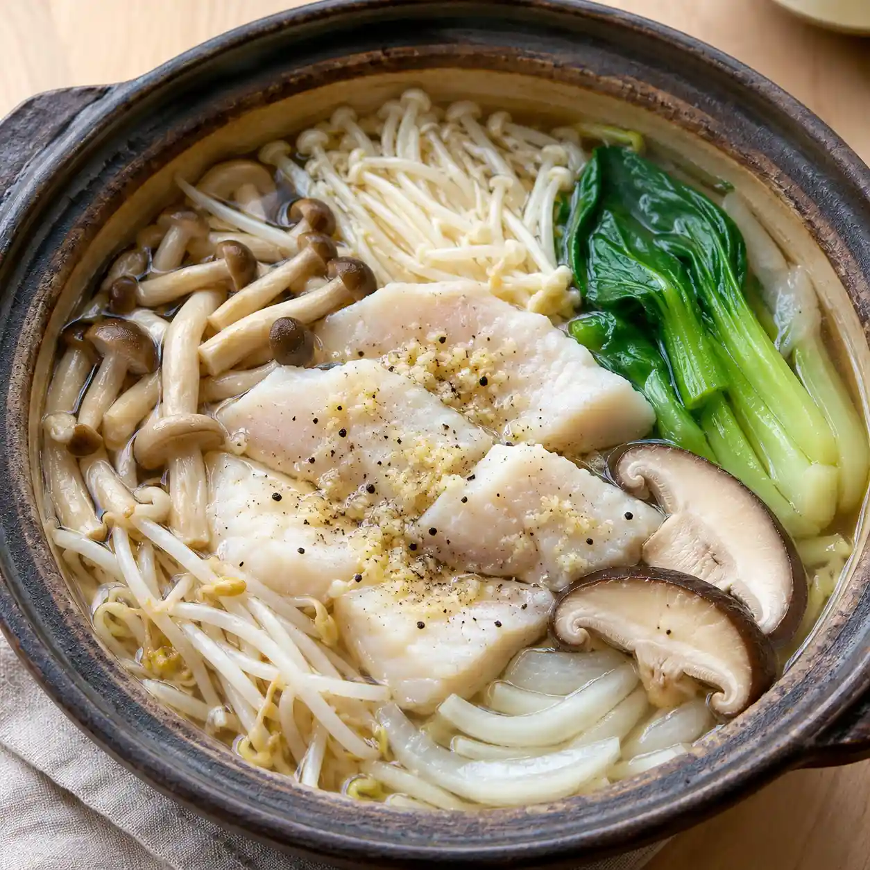 蒜香菇菇魚片湯泡鍋